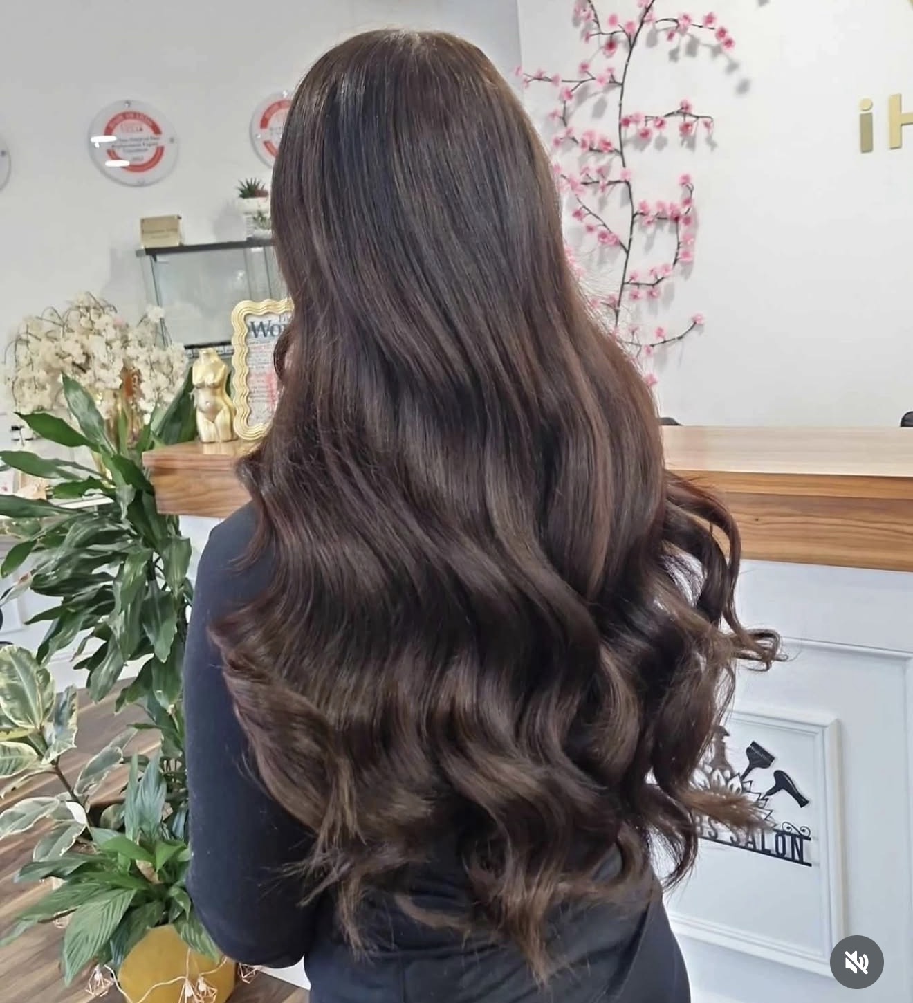Finished iHobbs brunette hair extensions result with curled length and natural shine